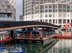 Eden Dock footbridge being towed into position