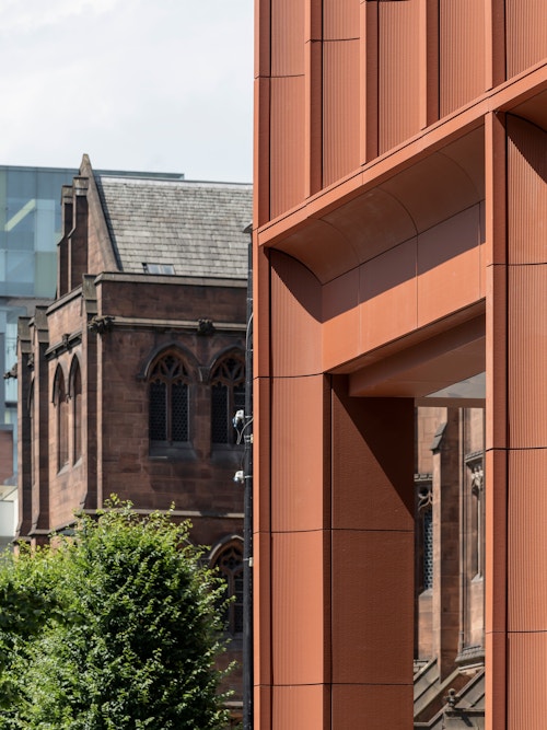Corner and colonnade detail with John Rylands Library in the background