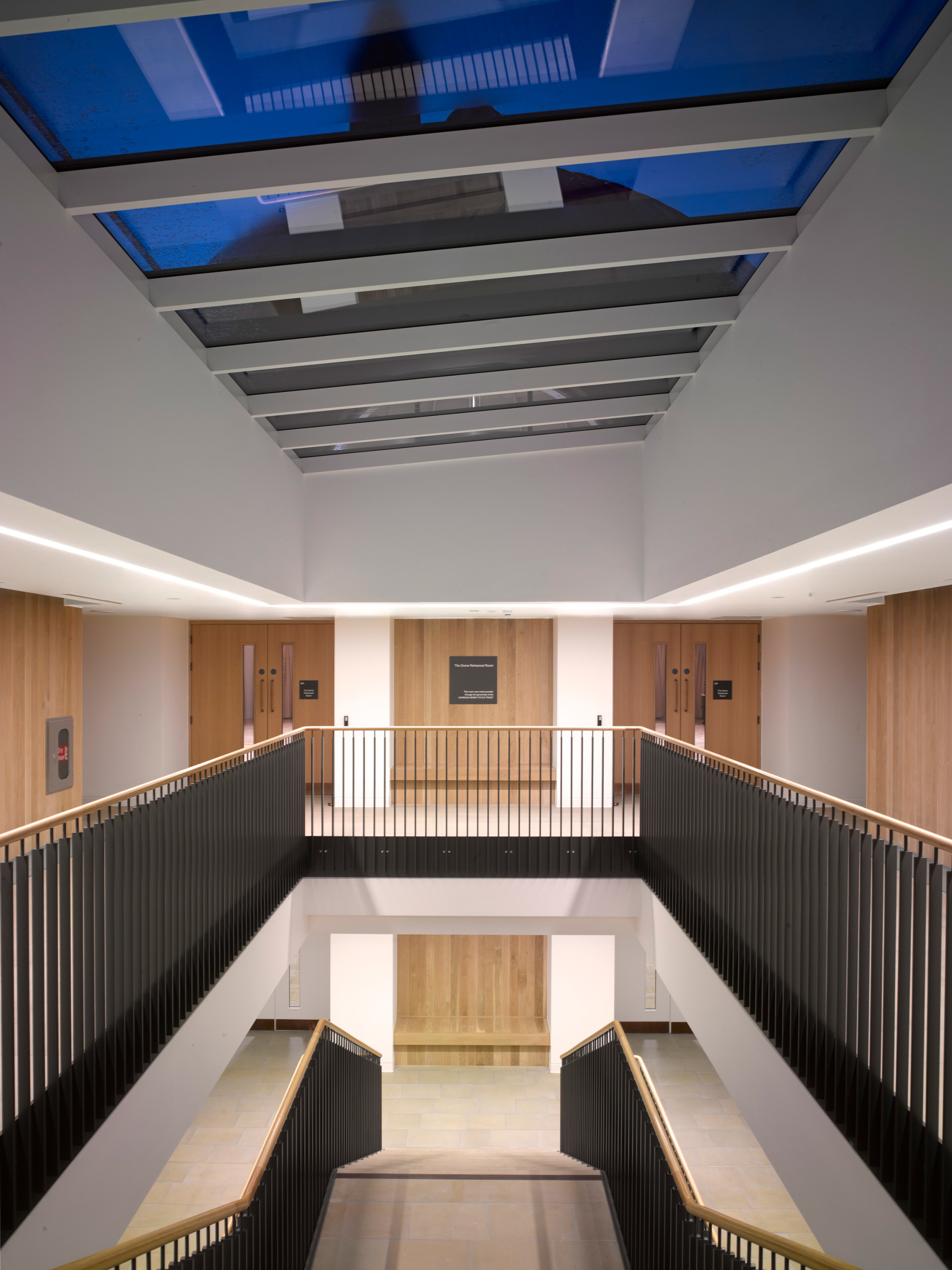 A skylit link connects the entrance pavilion and auditorium