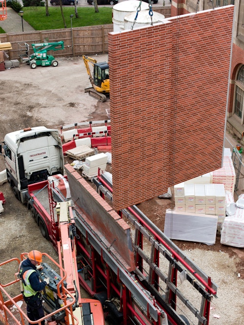 A precast system combined with traditional brick laying techniques were used during construction