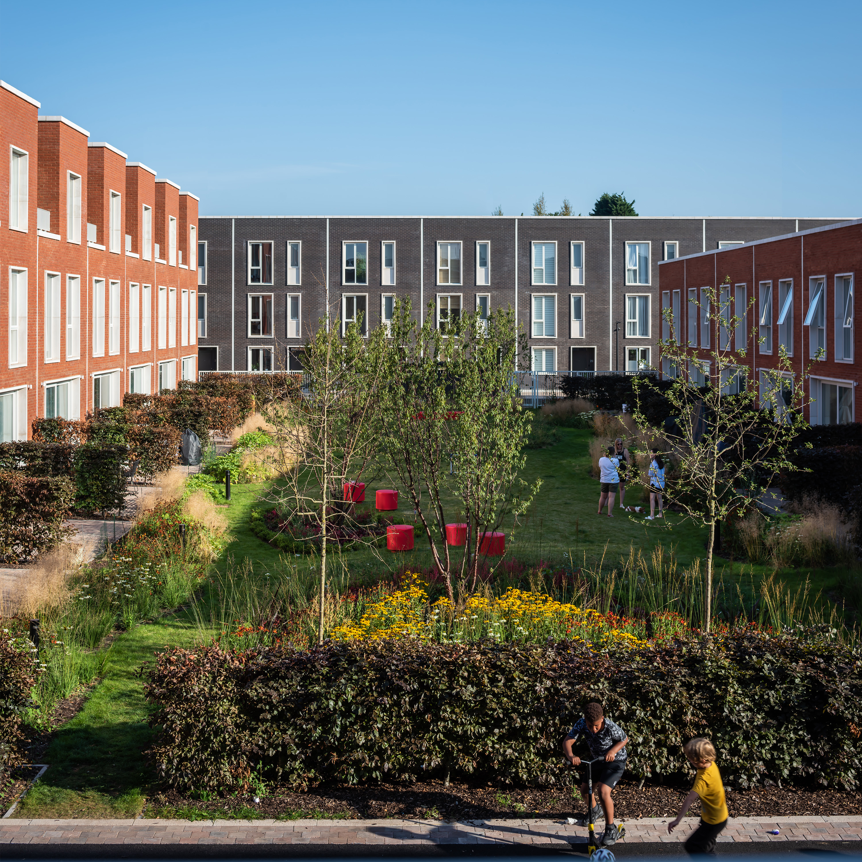 View of communal garden square with children playing