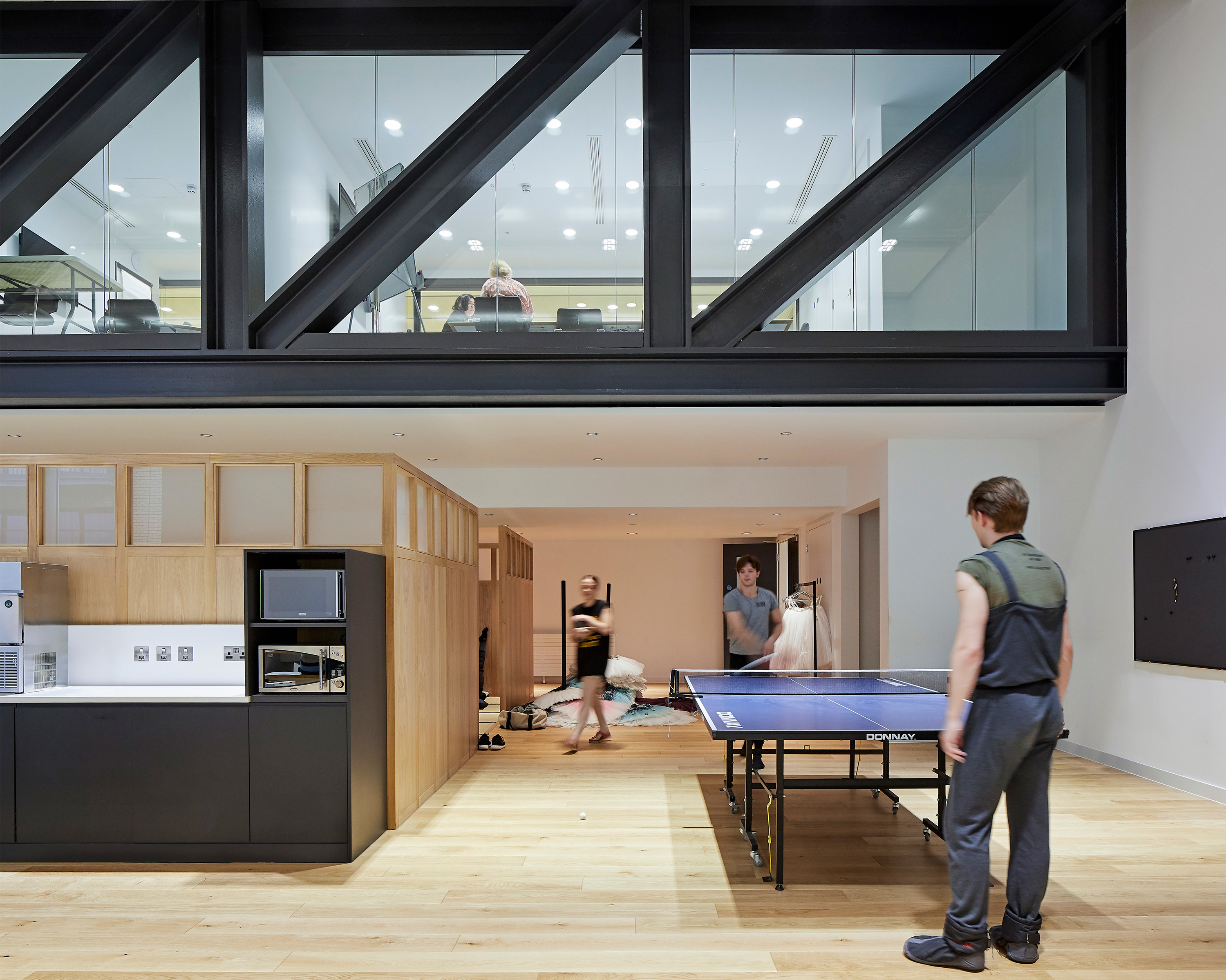 View of the green room shows the company's office space on the level above.