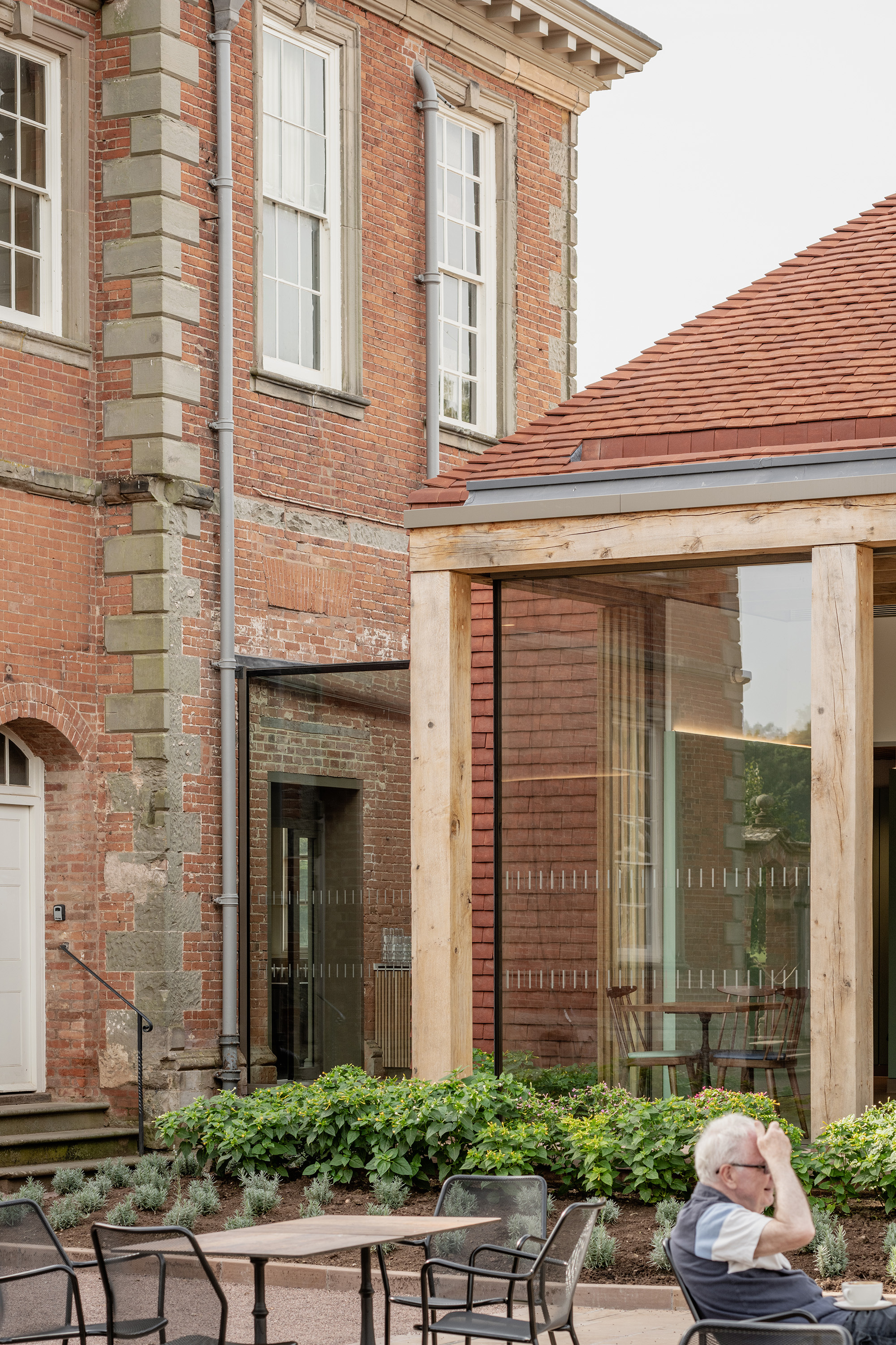 A glazed link form the Grade I listed building to the pavilion