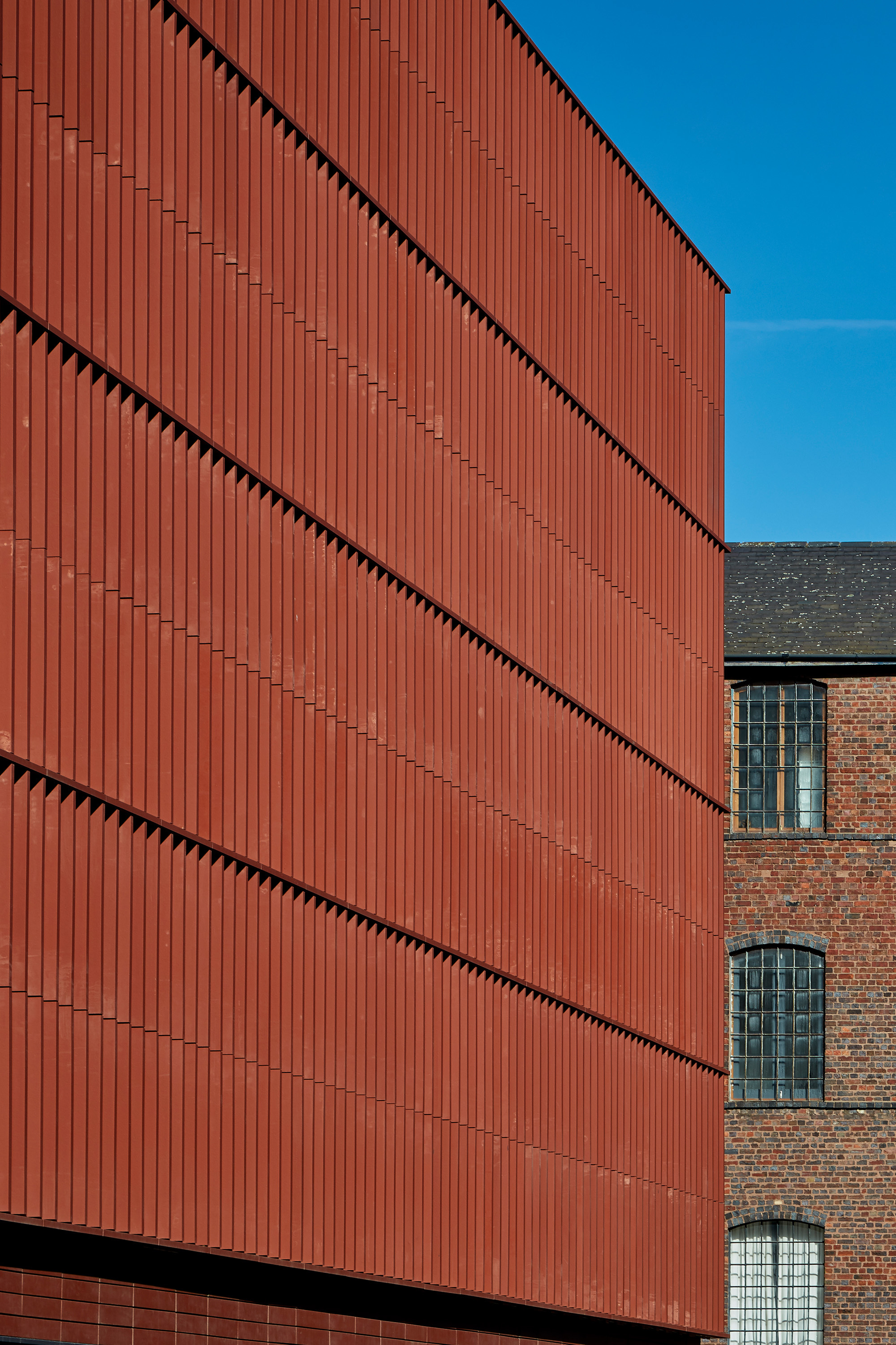 The car park is clad with terracotta baguettes