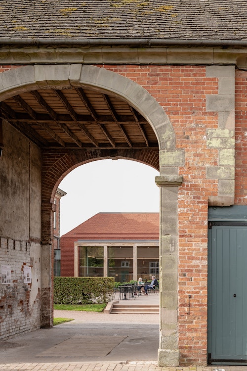 View to pavilion through the refurbished stable block