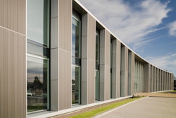 The building has been cladded with recycled timber-composite vertical panels